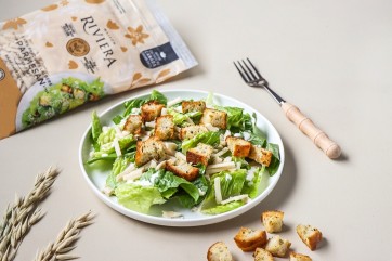 Caesar salad and parmesan style shredeed